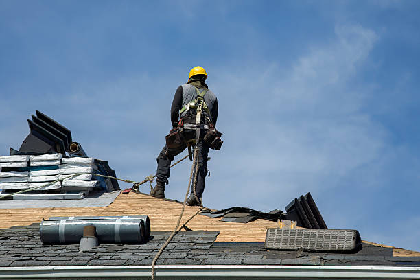 Professional Roofing technician working in Newtonville, MA